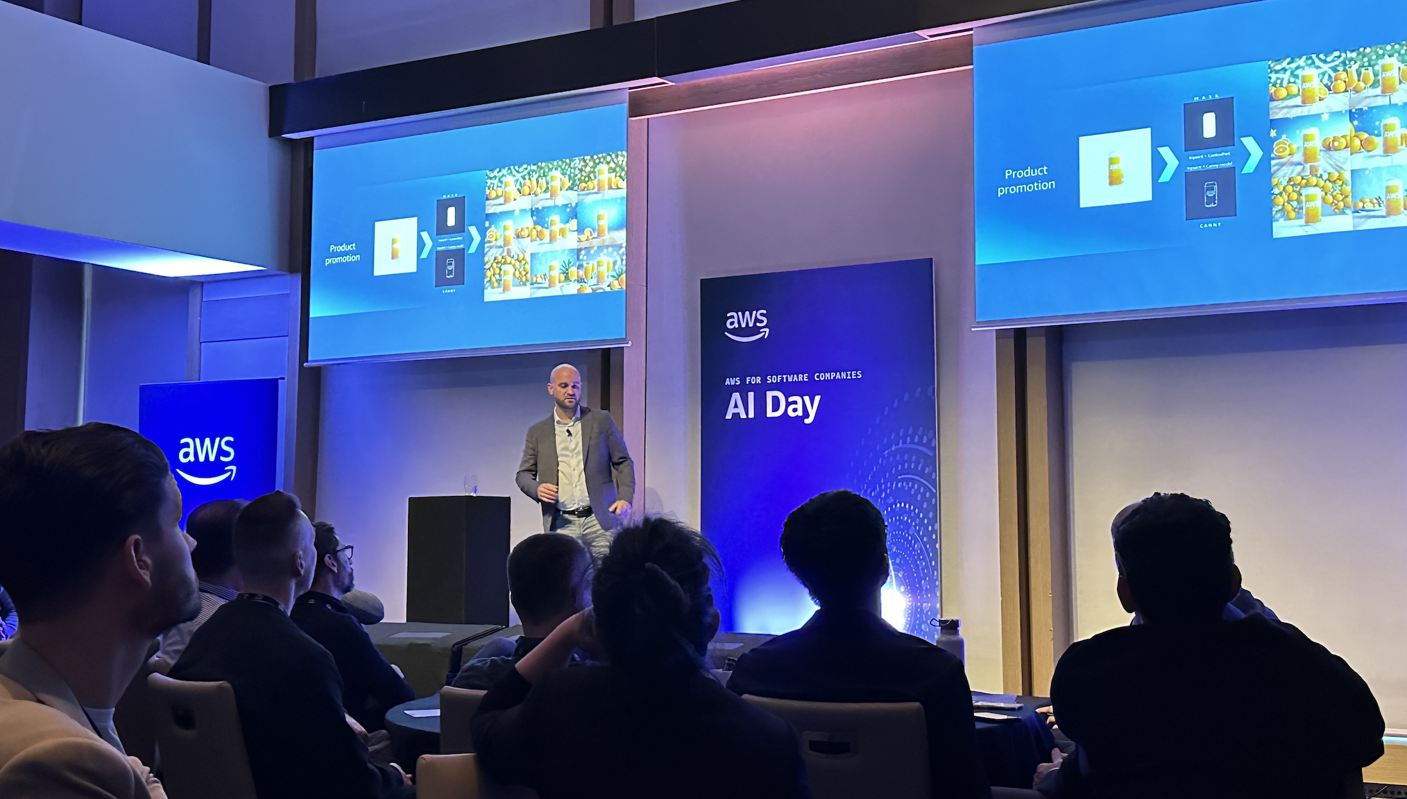 A keynote speaker at AWS AI Day Melbourne 2024 addressing a crowd of tech professionals and AI enthusiasts.